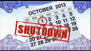 A calendar of the month of October 13 in front of the design of a blue bill with a stamp that is red lettering and says SHUTDOWN. The government shutdown explained in 3 minutes or less. 